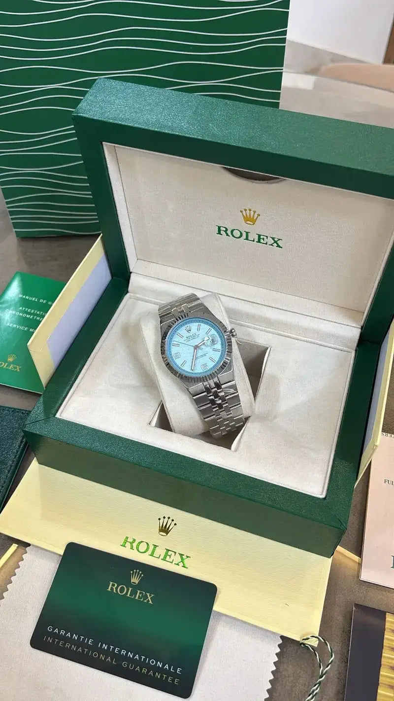 ROLEX OYESTER PERPETUAL LAND DWELLER SILVER SKY BLUE DIAL