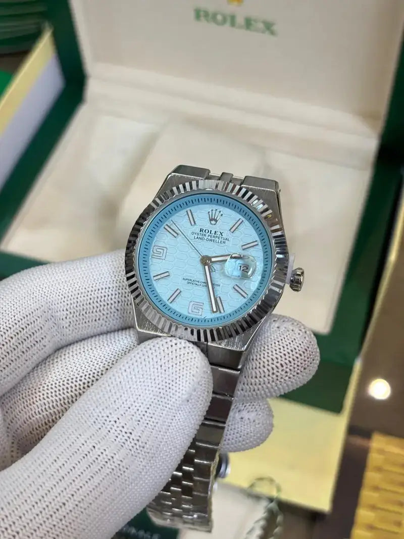 ROLEX OYESTER PERPETUAL LAND DWELLER SILVER SKY BLUE DIAL