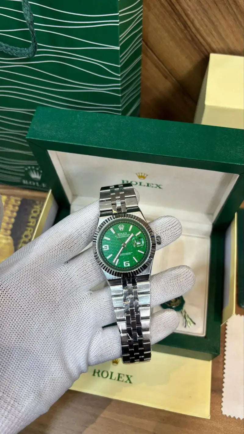 ROLEX OYESTER PERPETUAL LAND DWELLER SILVER GREEN DIAL