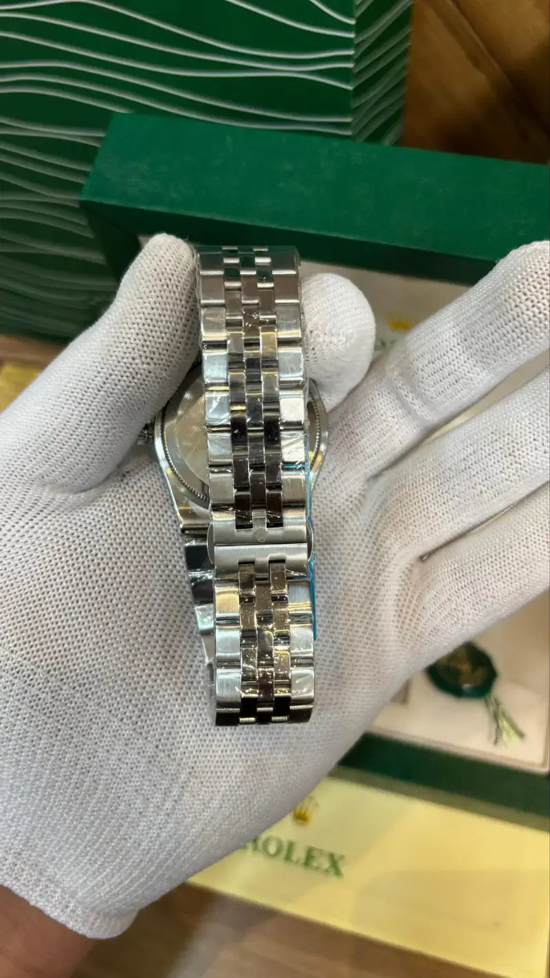 ROLEX OYESTER PERPETUAL LAND DWELLER SILVER GREEN DIAL