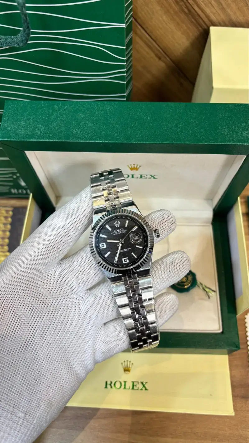 ROLEX OYESTER PERPETUAL LAND DWELLER SILVER BLACK DIAL